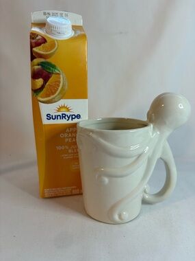 White porcelain octopus mug